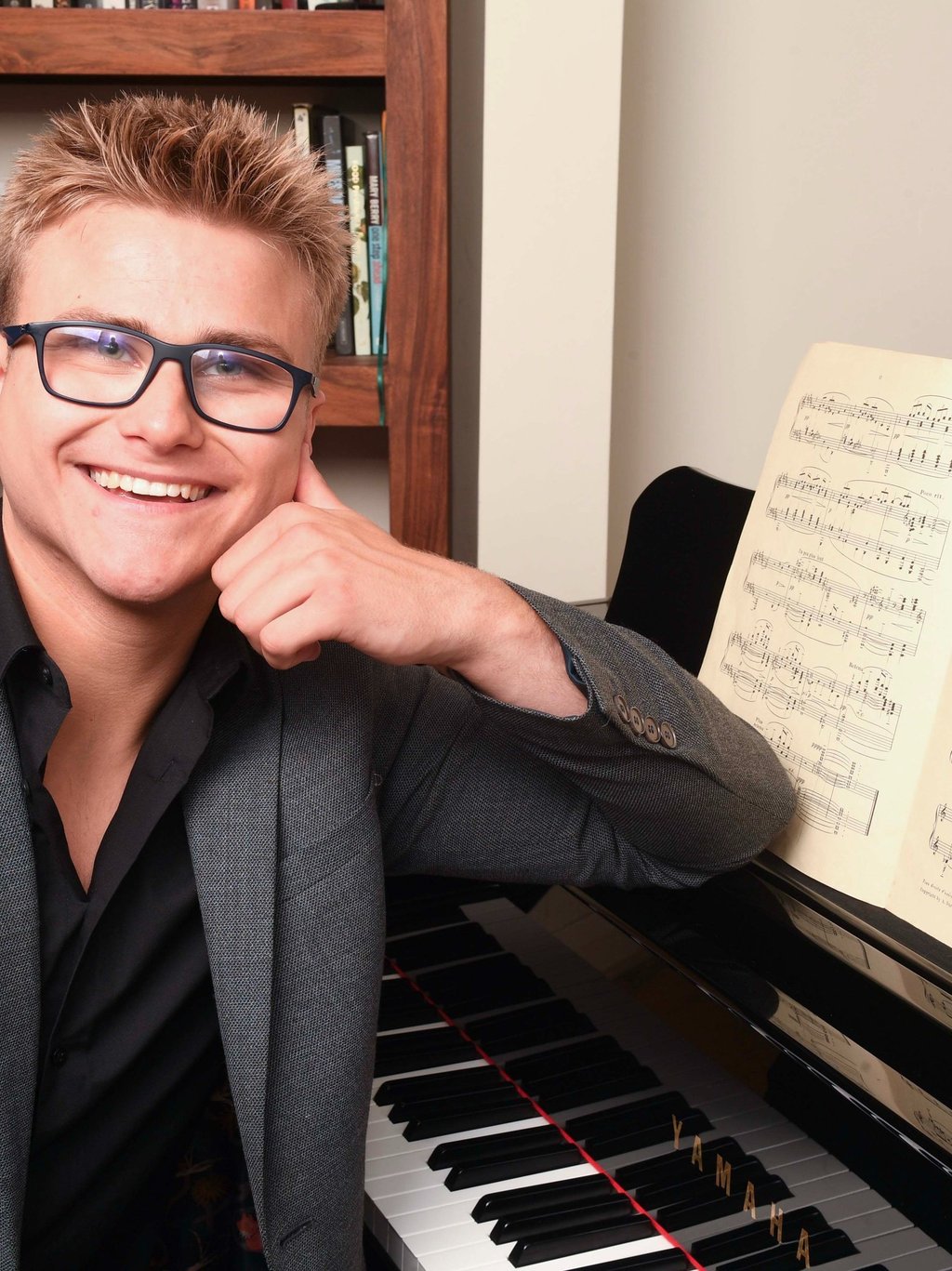 Norbert Steczkowski, conservatoire-trained piano teacher, at the piano in his Harrow studio (HA2)